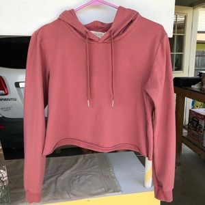 pink cropped hooded sweatshirt